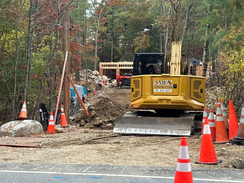 AMEX excavator on a South Shore residential jobsite