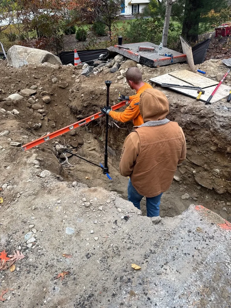 AMEX crew installing underground water line utilities